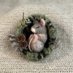 Maus im Nest